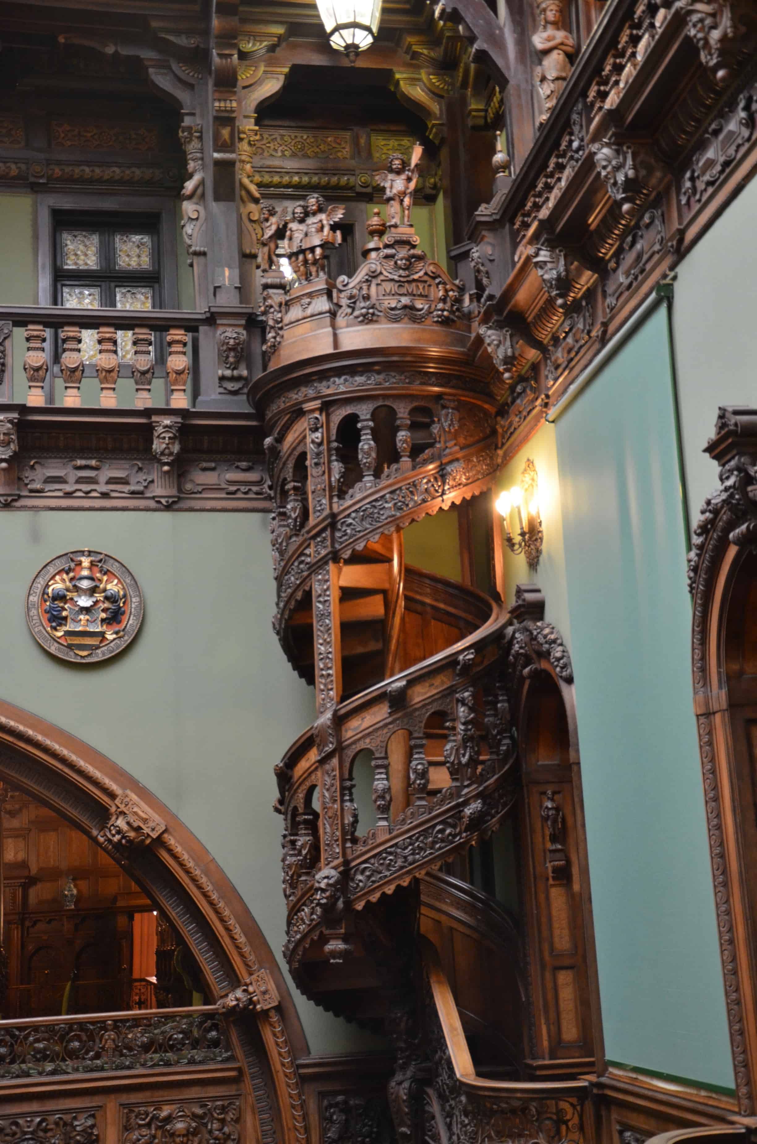 Spiral staircase in the Hall of Honour at Peleș Castle in Sinaia, Romania