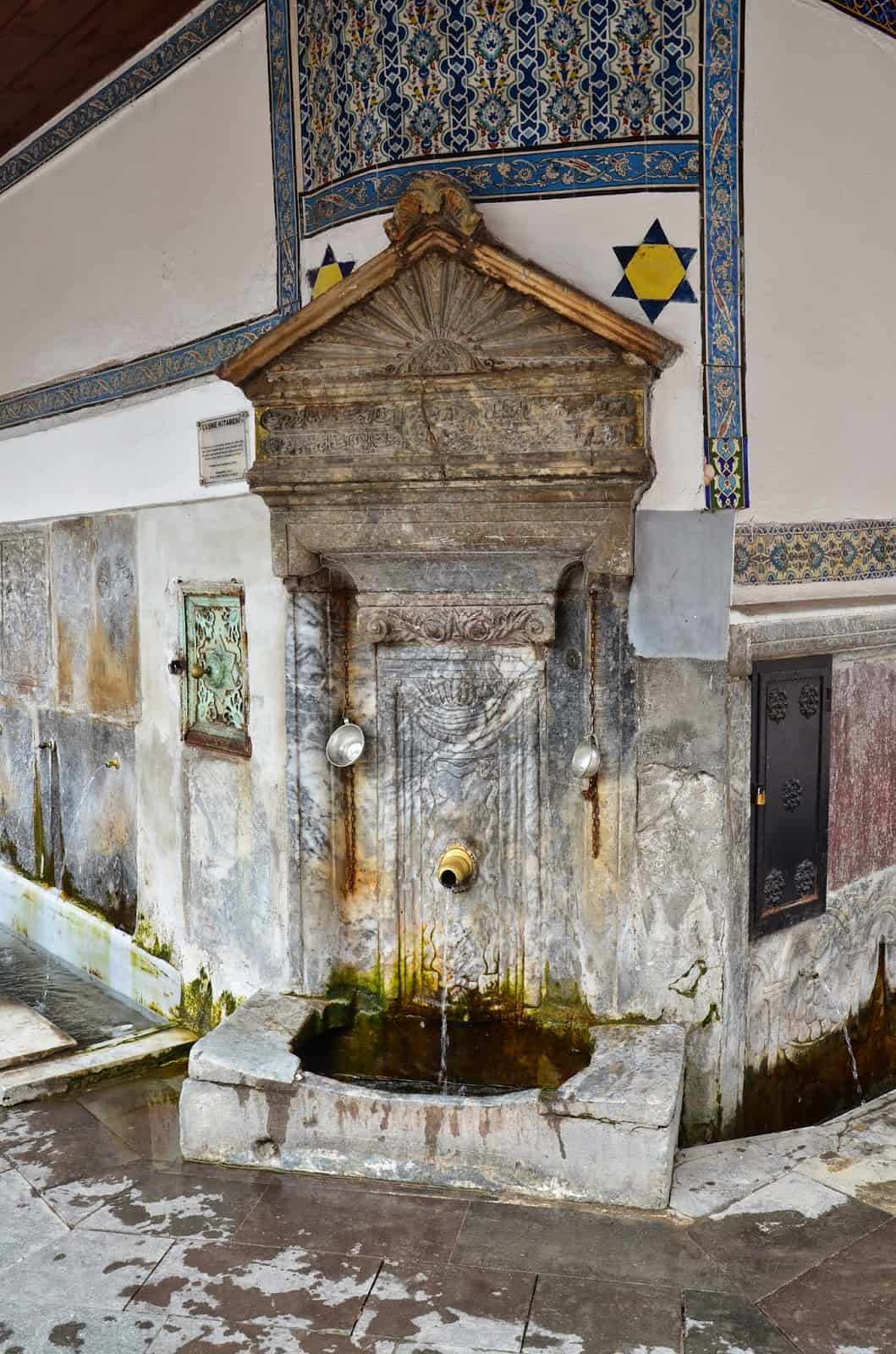 A public fountain attached to the ablutions fountain at the Great Mosque in Kütahya, Turkey