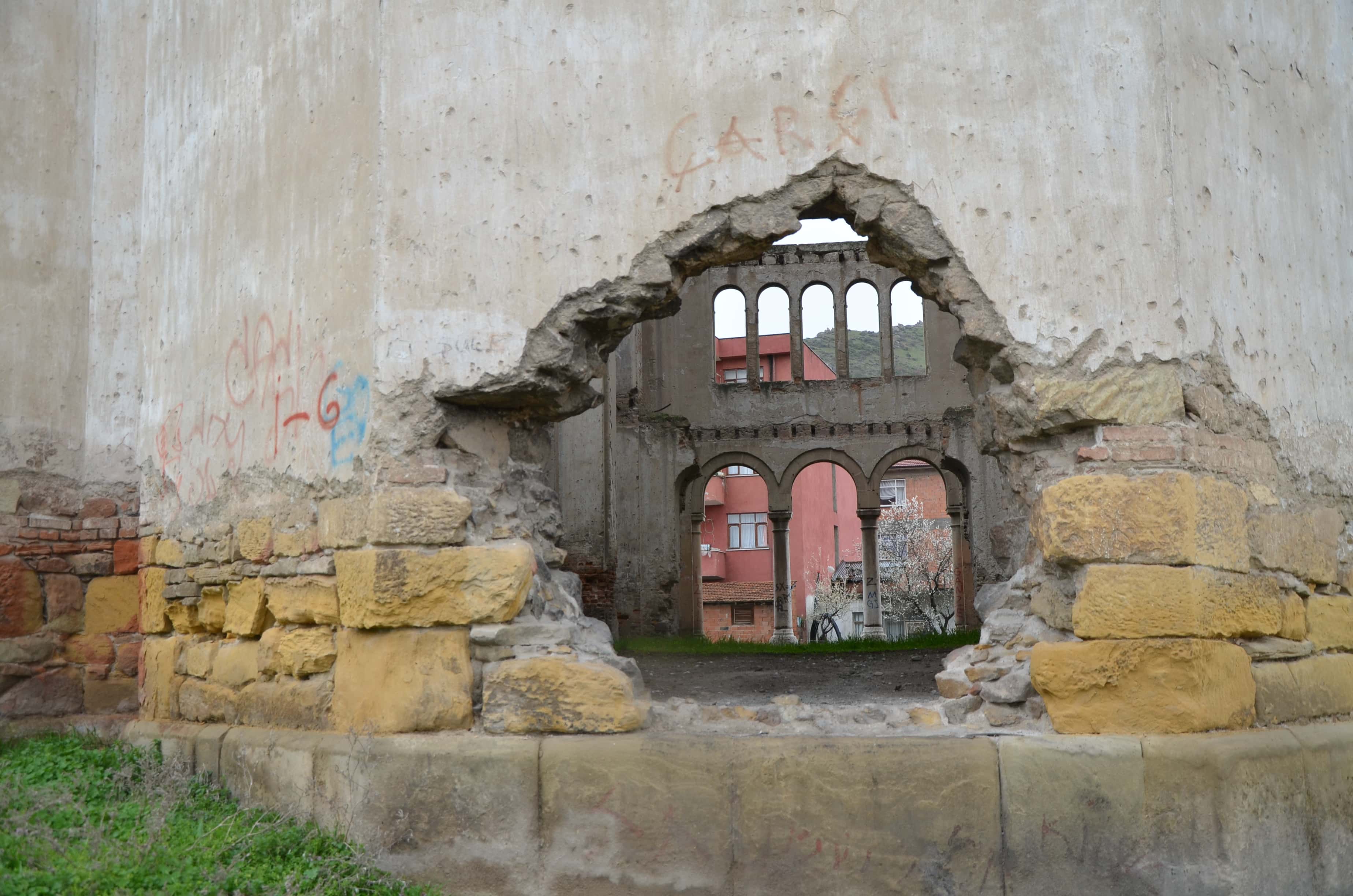 Looking through a hole in the wall of St. George Church