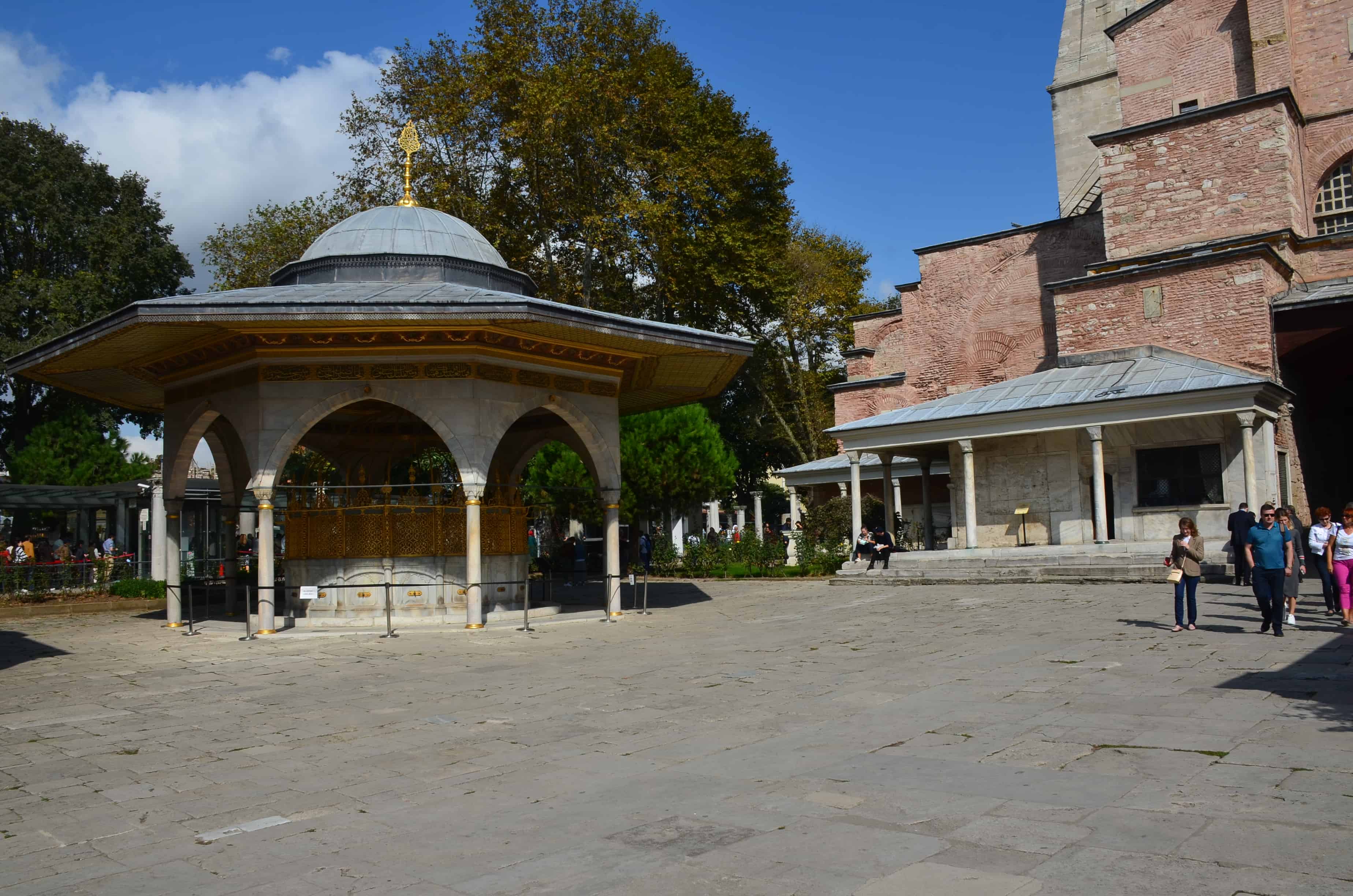 Fountain of Mahmud I (left) and ablutions fountain (right) at Hagia Sophia in Istanbul, Turkey