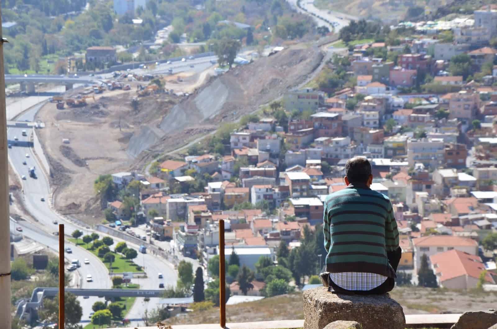 A local enjoying the views at Kadifekale in Izmir, Turkey