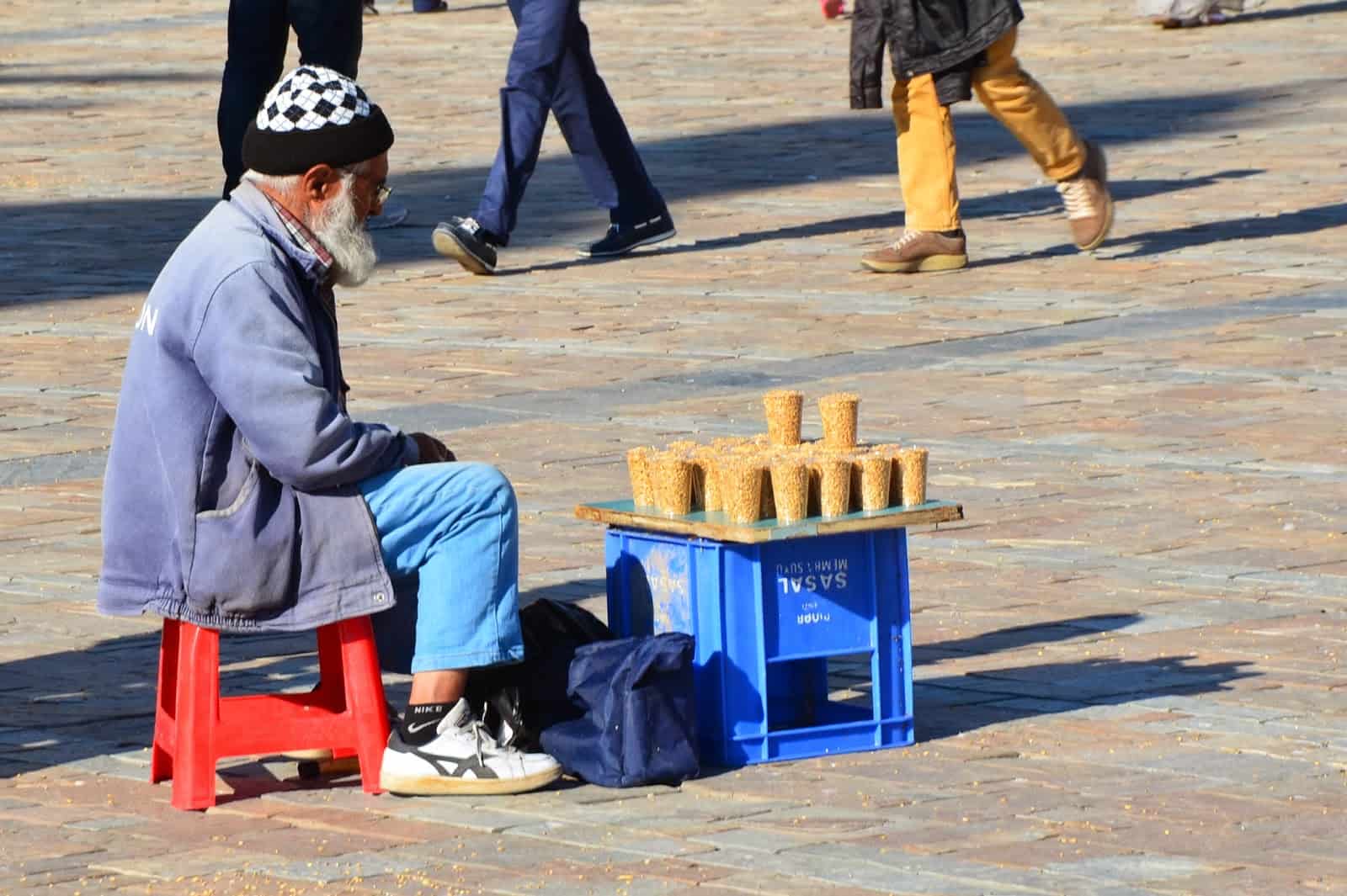 Man contributing to the pigeon population in Izmir, Turkey