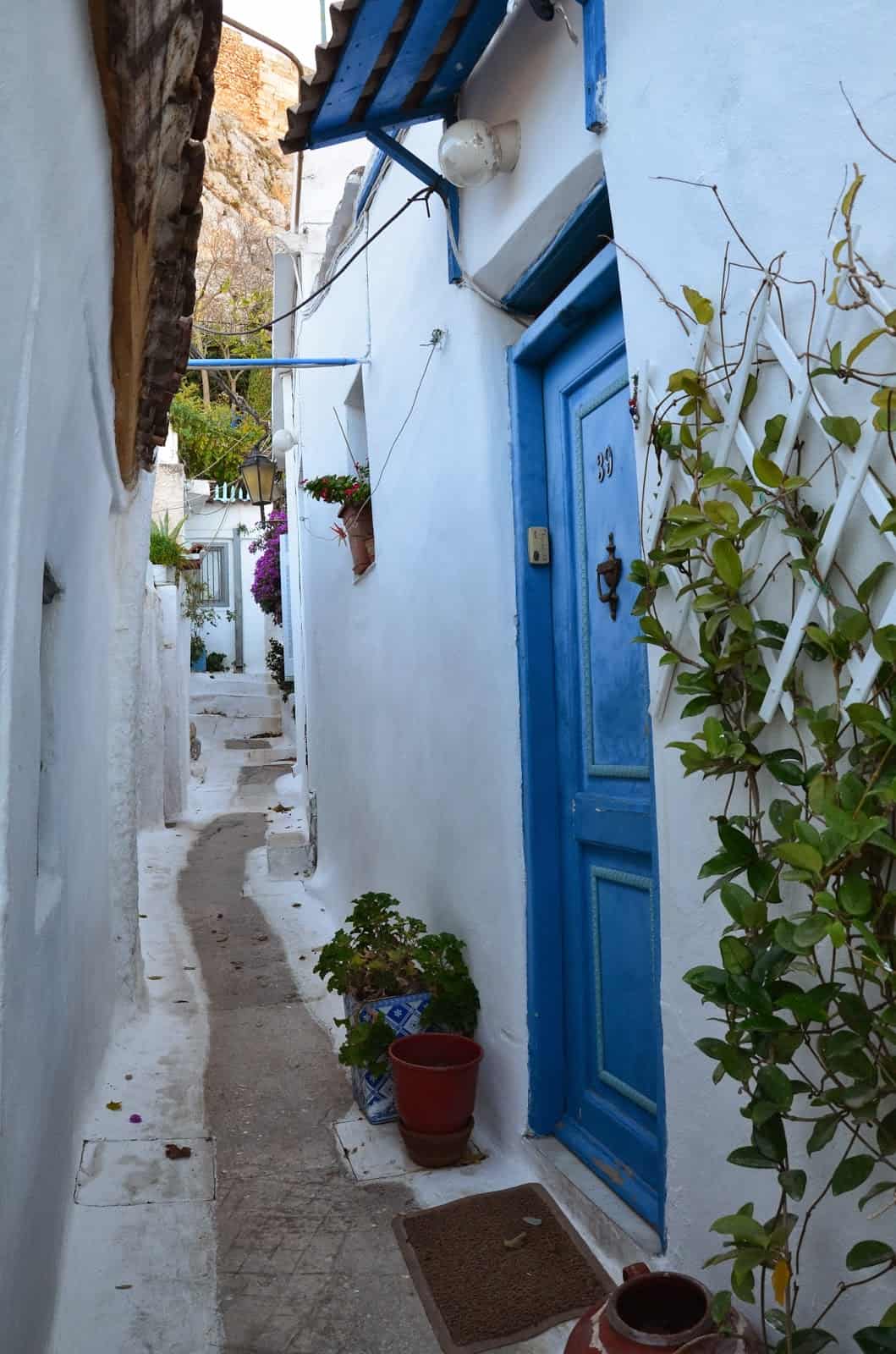 An alley with whitewashed homes in Anafiotika, Athens, Greece