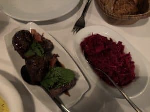Eggplant stuffed with sour cherries (left) and beet salad (right) at Leb-i Derya