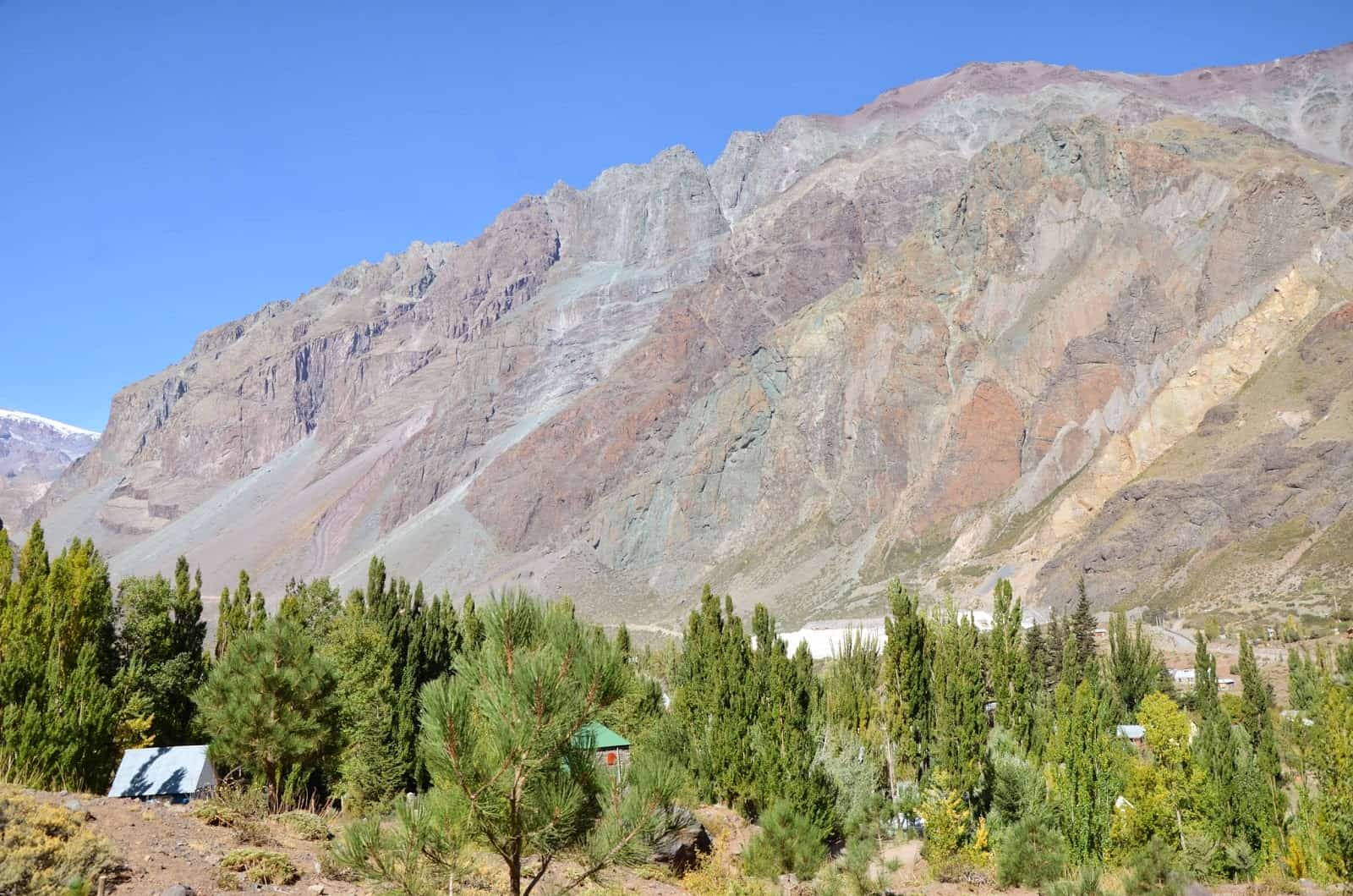 The changing colors of the mountain near the end of the day at El Morado, Cajón del Maipo, Chile