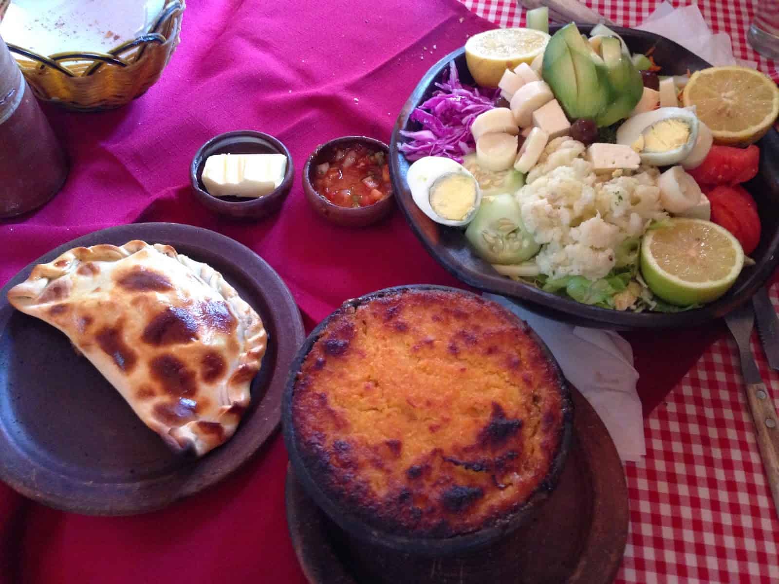 Empanada, pastel de choclo, and plato vegeteriano at Restorant San Pedro in Pomaire, Chile