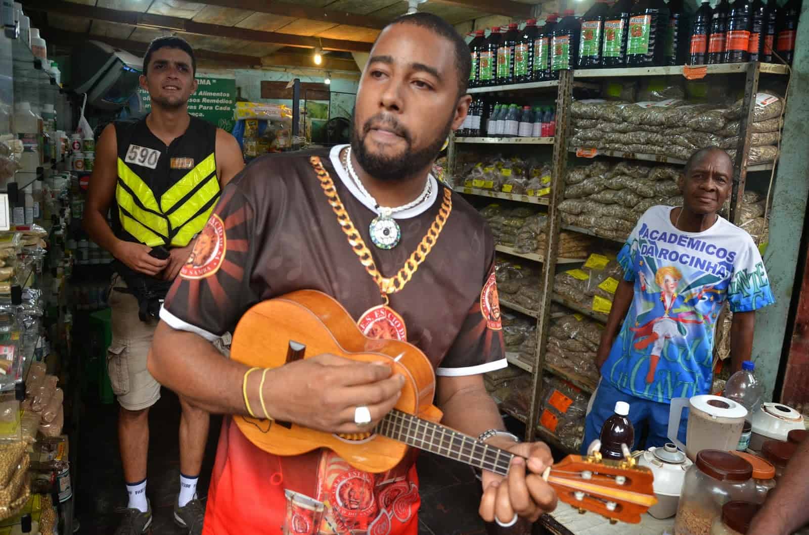 A shopkeeper entertaining us at Rocinha favela, Rio de Janeiro, Brazil