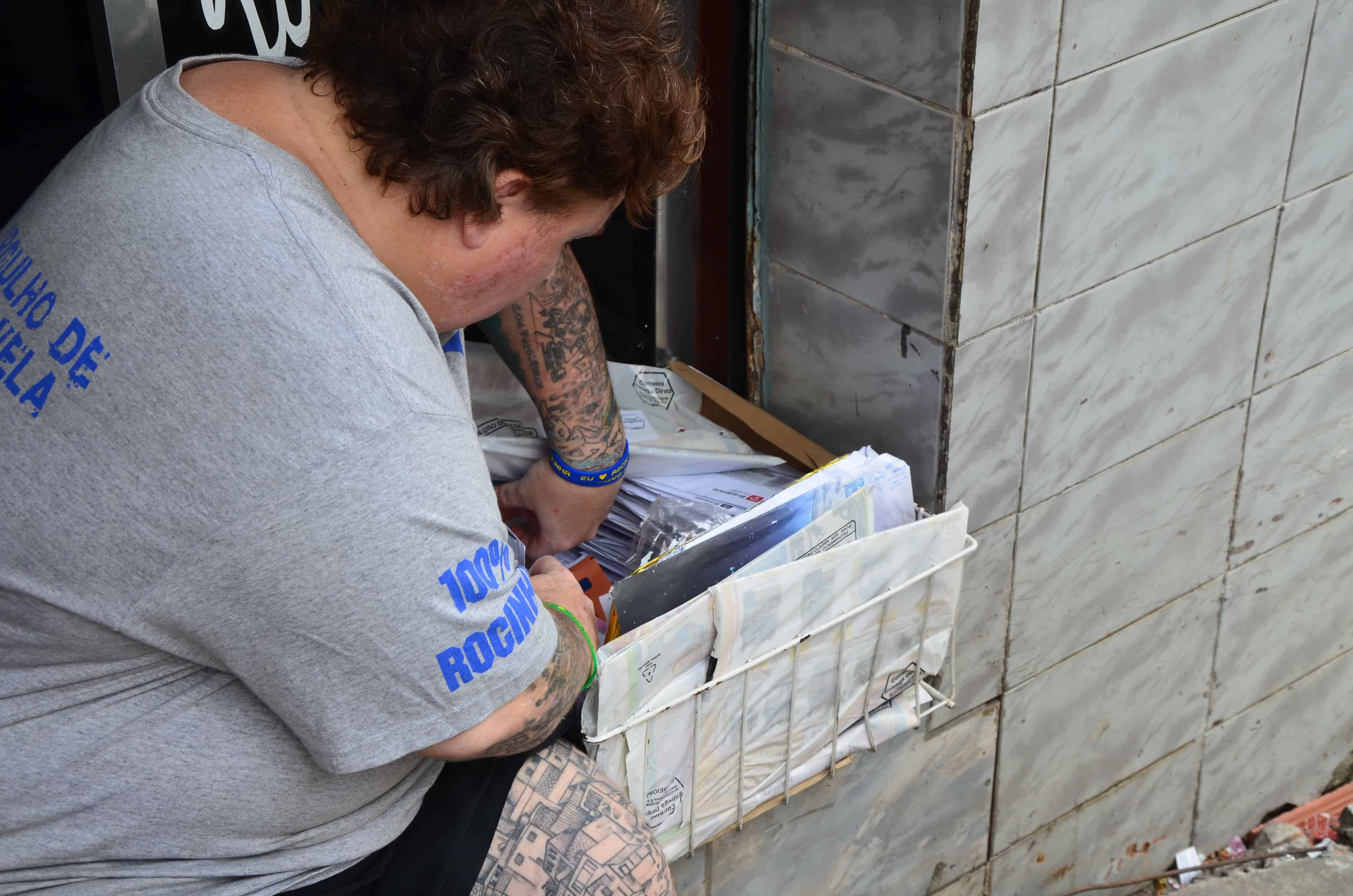 Mail delivery at Rocinha favela in Rio de Janeiro, Brazil