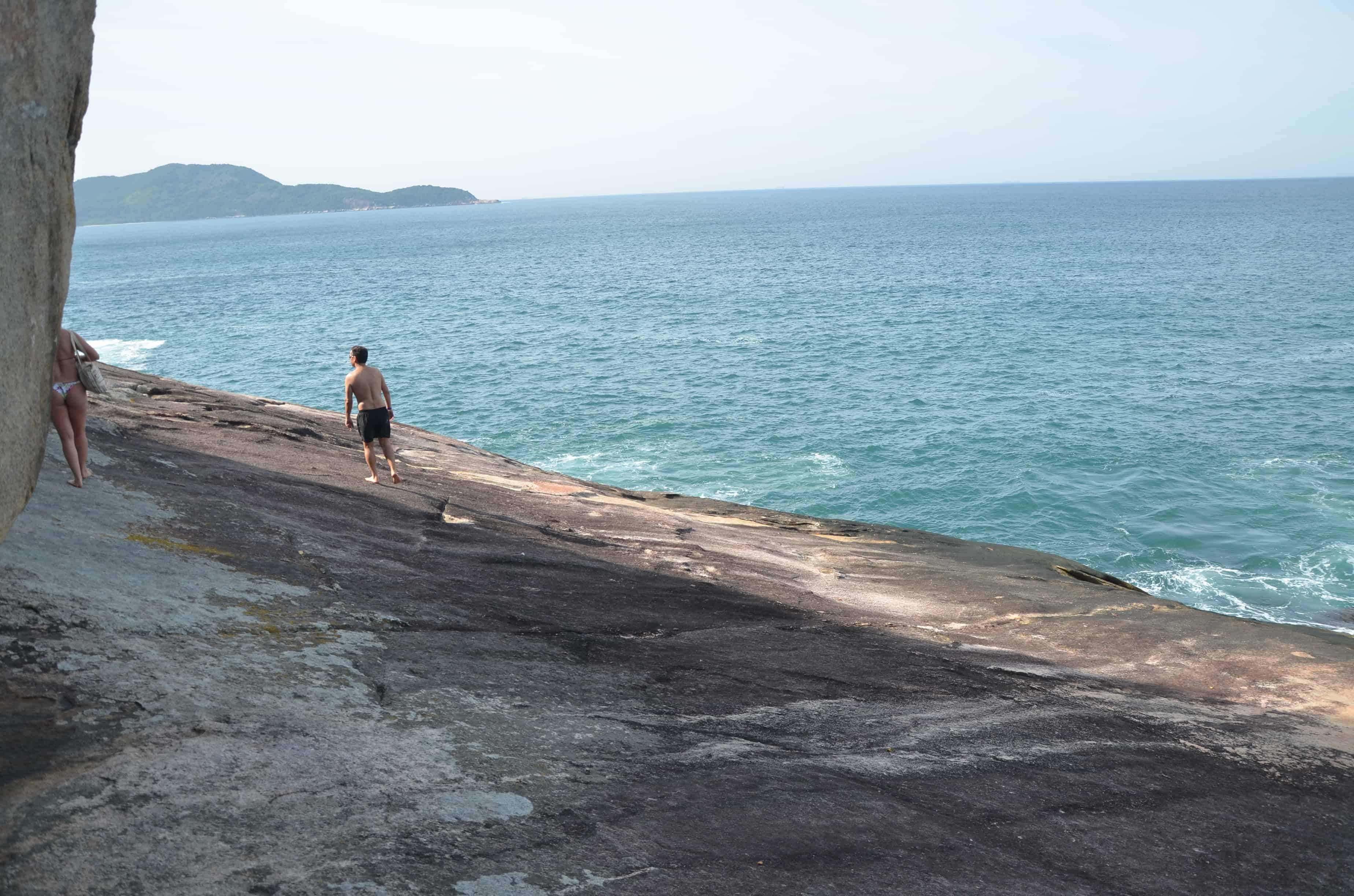 Walking on the rocks at Caxadaço Beach