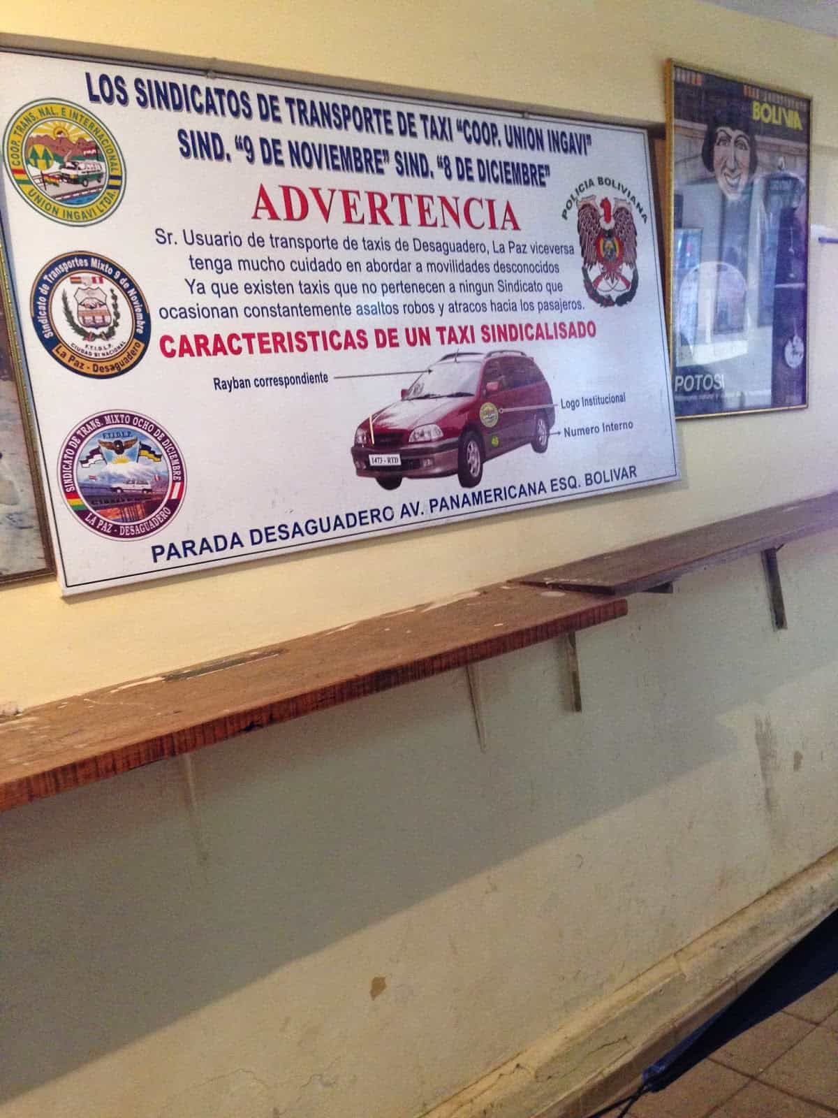 A warning about taxis at the Desaguadero border crossing, Bolivia