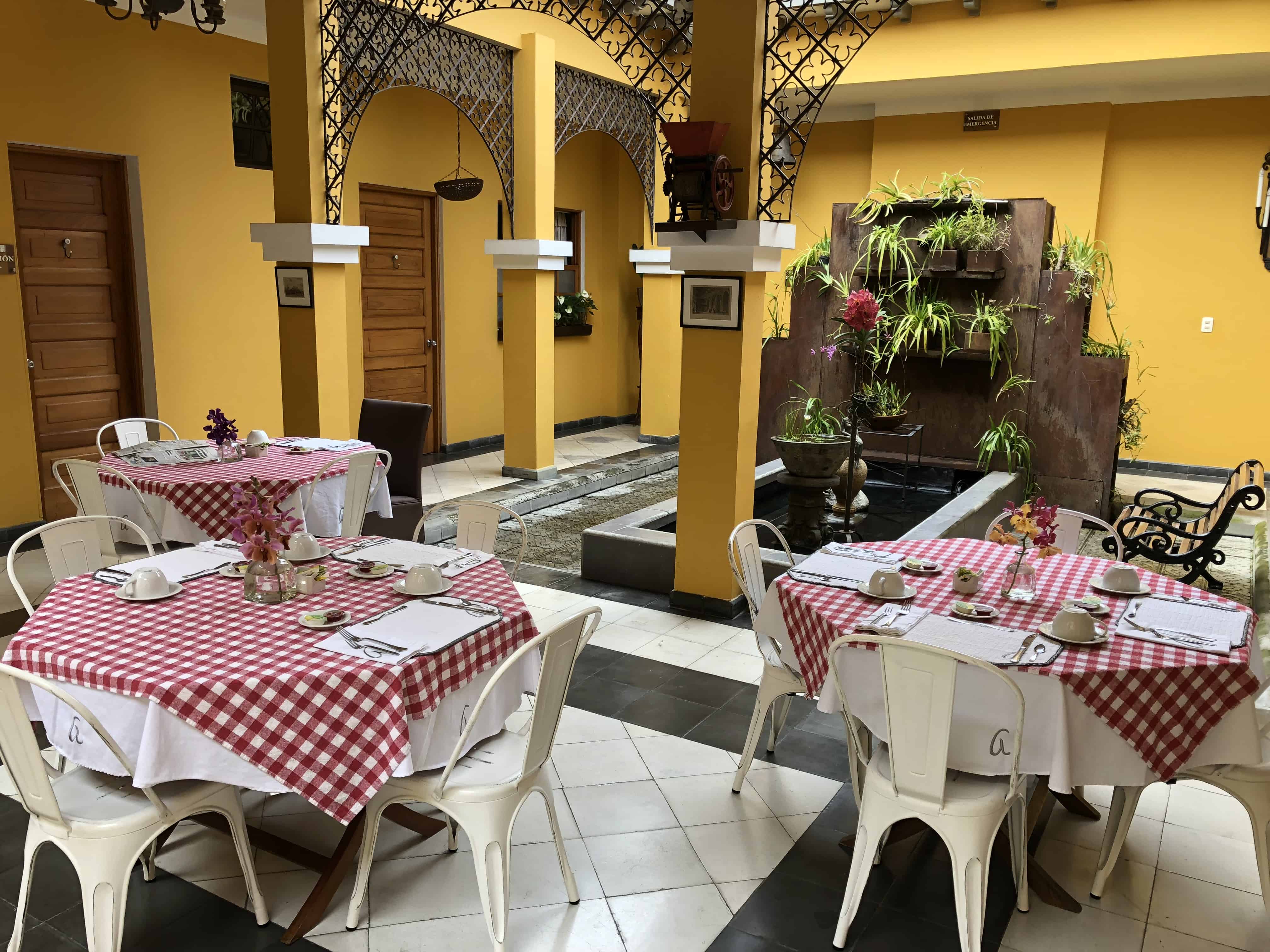 Breakfast area at Hotel Boutique Don Alfonso in Pereira, Risaralda, Colombia