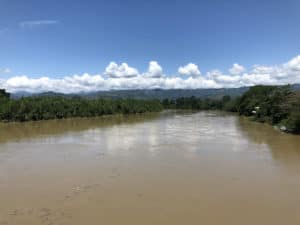 Looking west down the Cauca River from the Bernardo Arango Bridge in La Virginia, Colombia