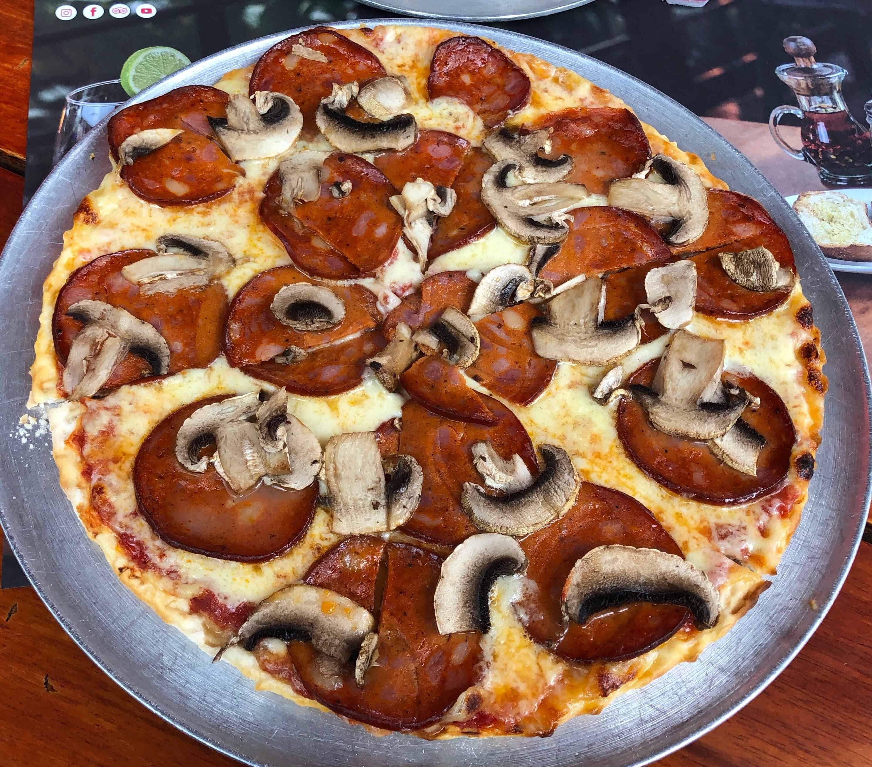 Pepperoni and mushroom pizza at Piccolo