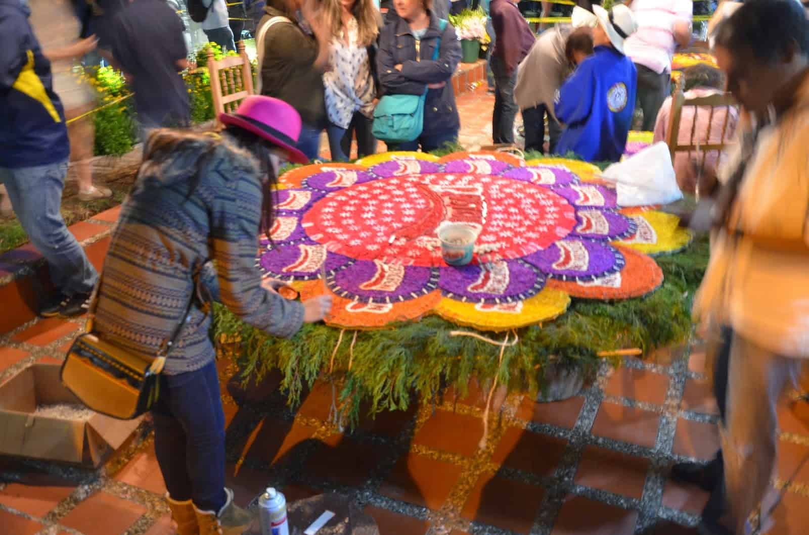 A woman making a float at the Silleteros Tour in the Flower Festival, Medellín, Antioquia, Colombia