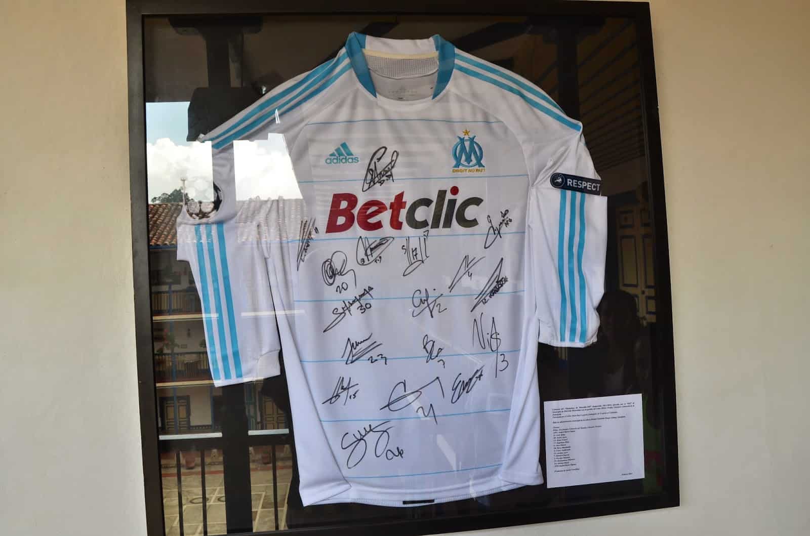 Signed football jersey from Olympique de Marseille at the Casa de la Cultura in Marsella, Risaralda, Colombia