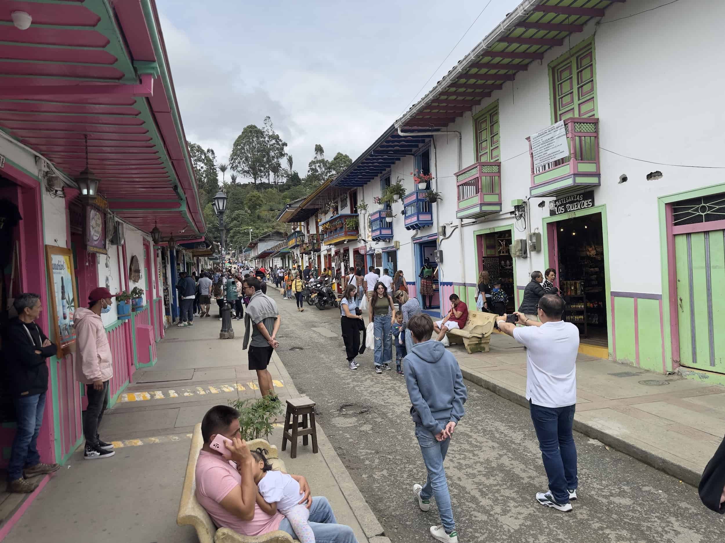 Tourist taking photos on Calle Real