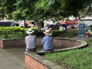 Two men sitting in the plaza of Viterbo