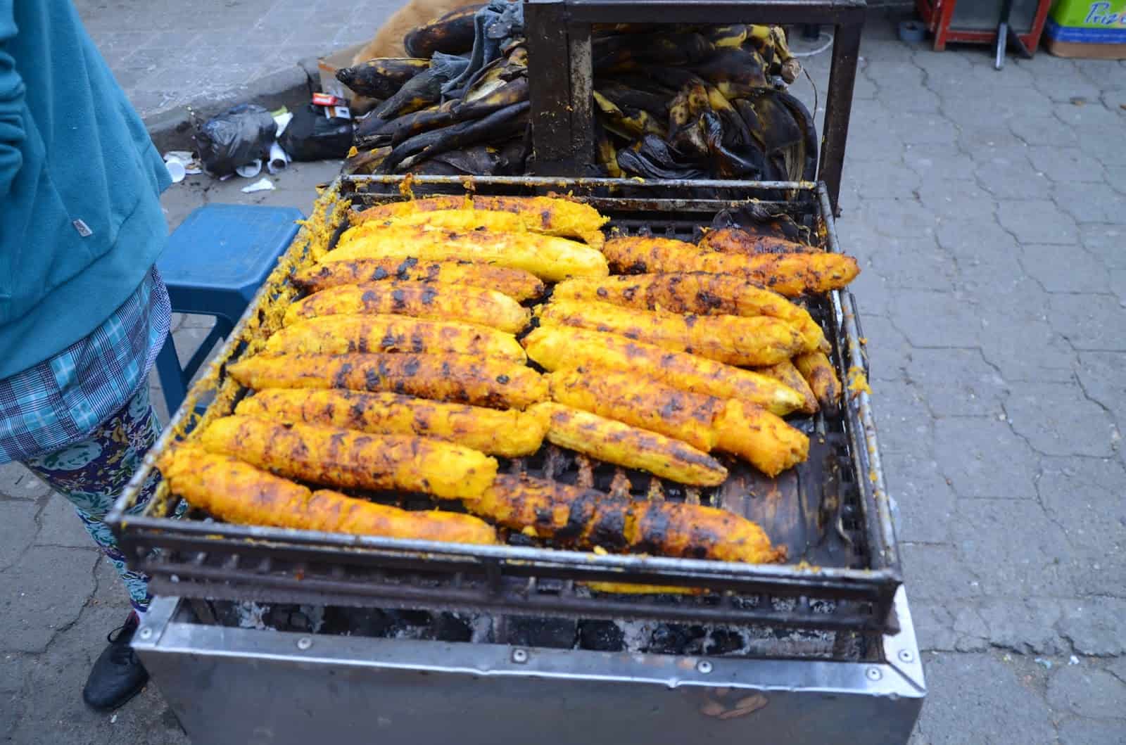 Grilled plantains at the daily market in Otavalo, Ecuador