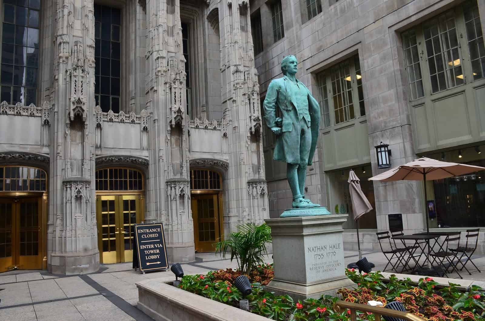 Entrance and statue of Nathan Hale at the Tribune Tower on the Magnificent Mile in Chicago