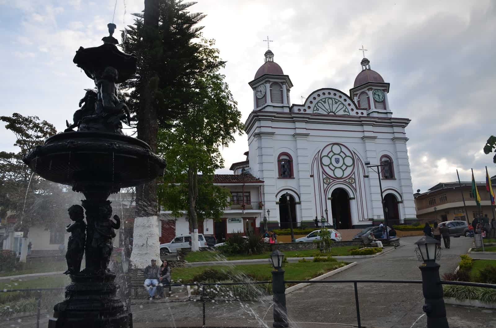 Fountain and church in Aguadas, Caldas, Colombia