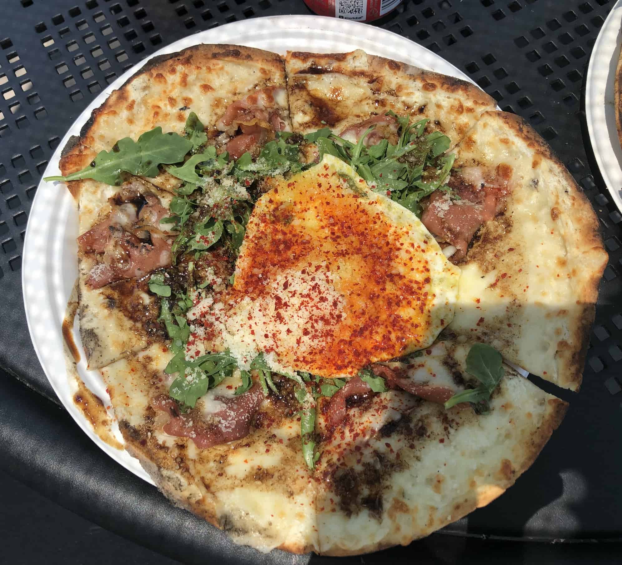 Prosciutto with arugula and a fried egg at The Rolling Stonebaker