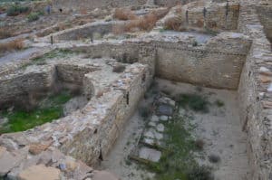 Kiva and ruined rooms at Pueblo del Arroyo at Chaco Culture National Historical Park in New Mexico