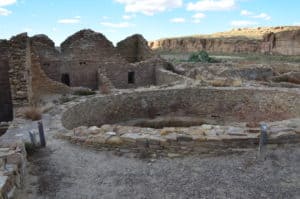 Kiva and ruined rooms at Pueblo del Arroyo at Chaco Culture National Historical Park in New Mexico