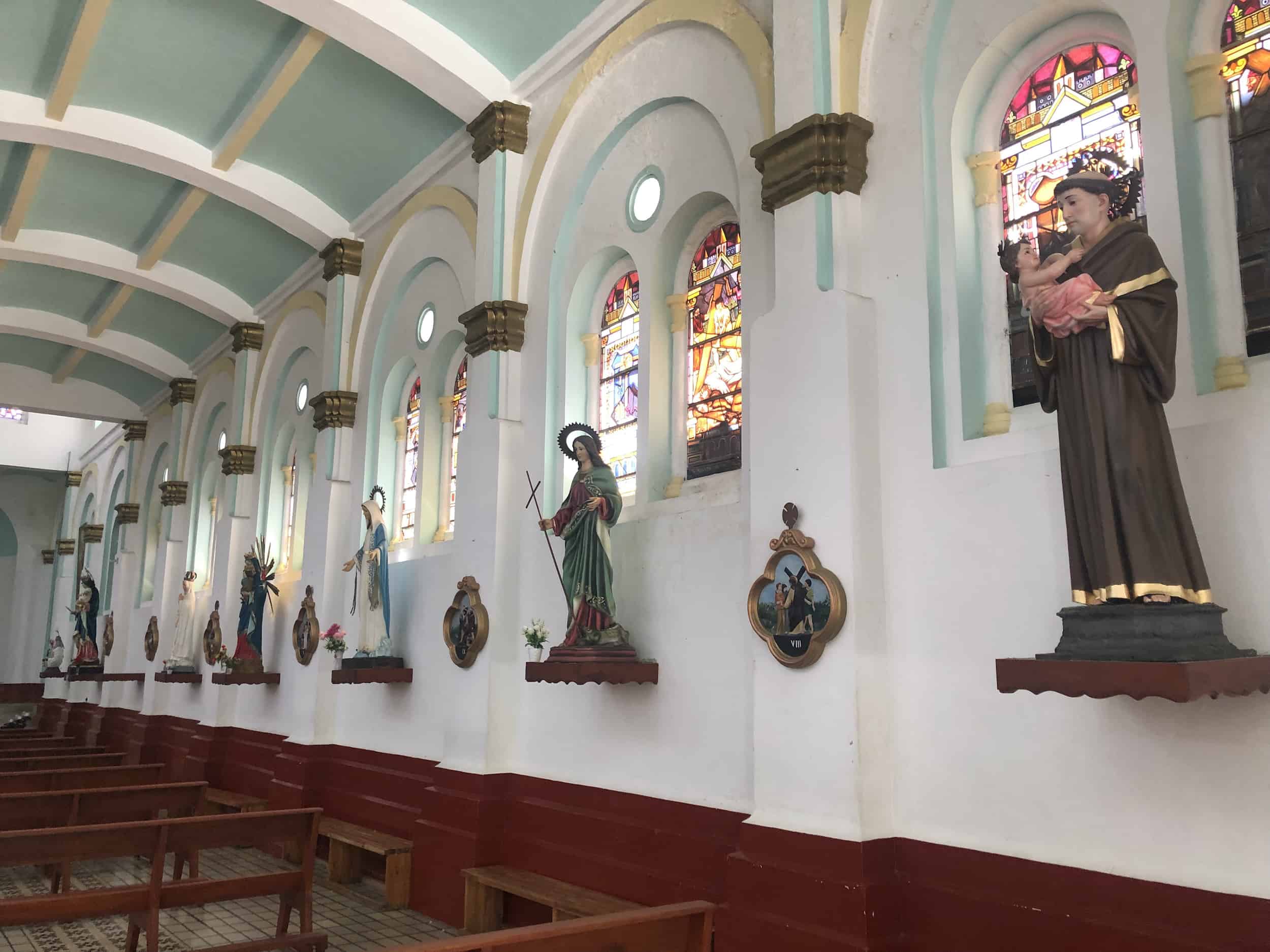 Statues and stained glass windows at Our Lady of Mercy
