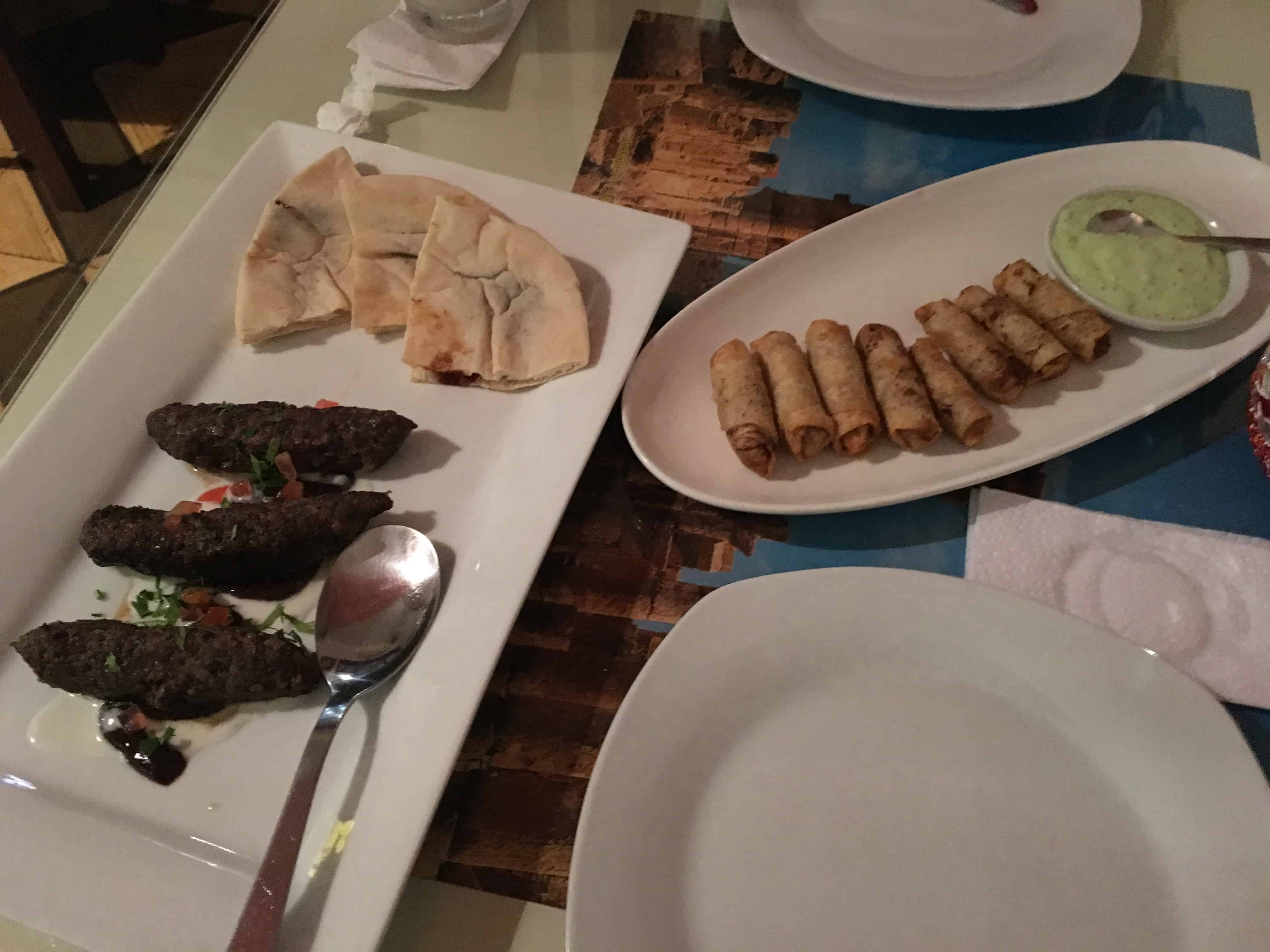 Kebabs and chicken and sumac rolls at Litany in Cali, Colombia