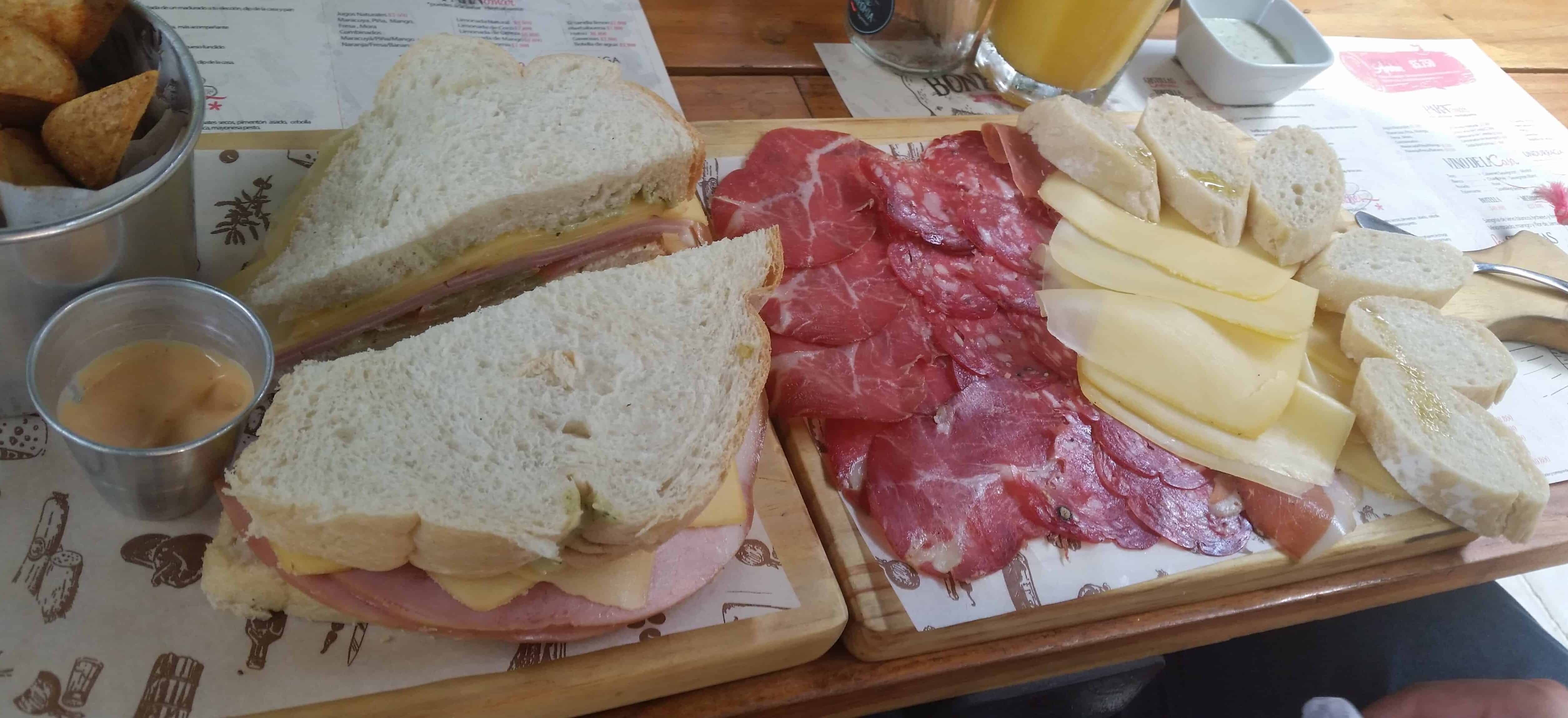 Sandwich, meats, and cheeses at Bonhomía in Provenza, El Poblado, Medellín, Antioquia, Colombia