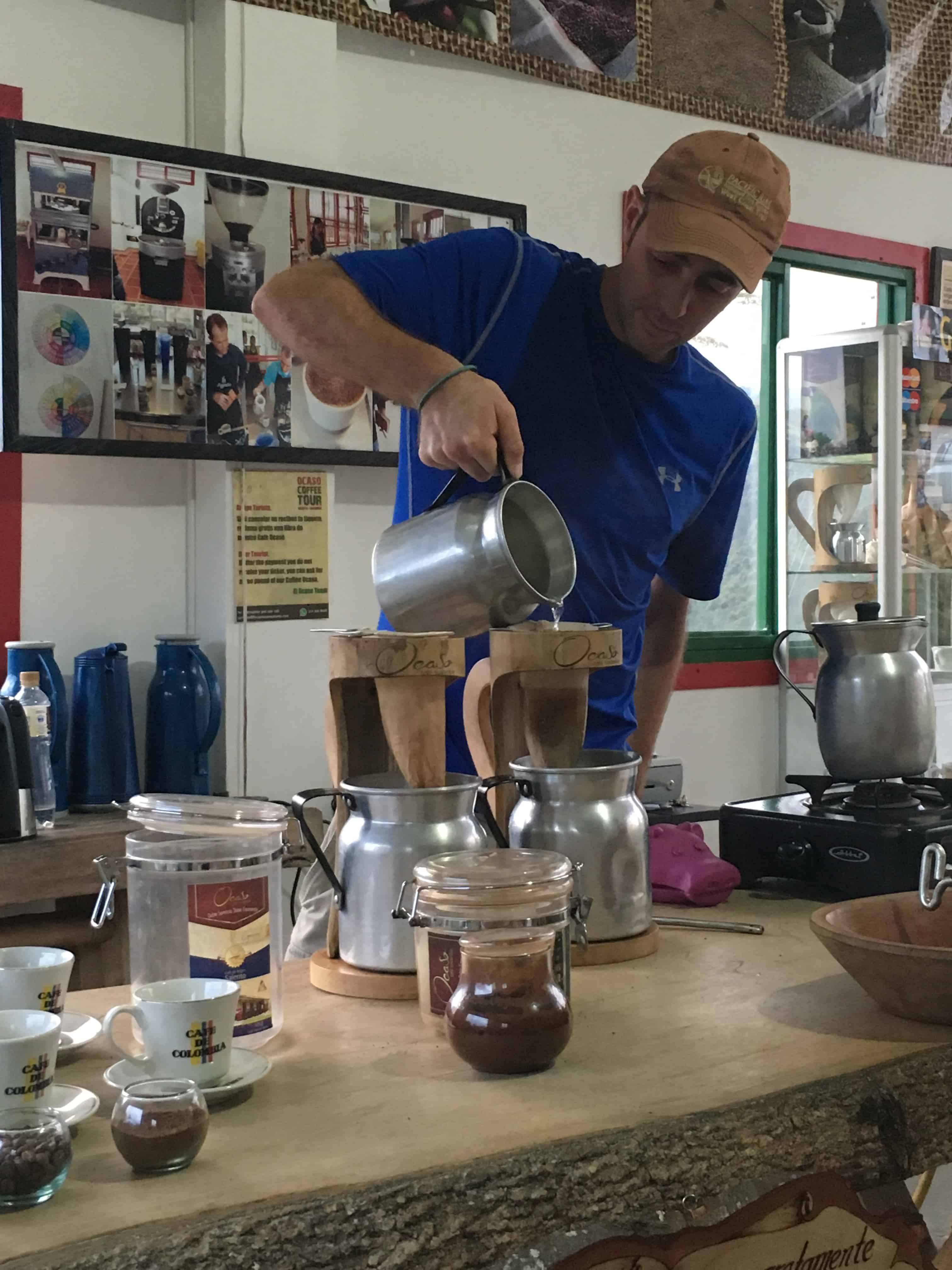 Tim pouring coffee at Finca El Ocaso in Salento, Quindío, Colombia