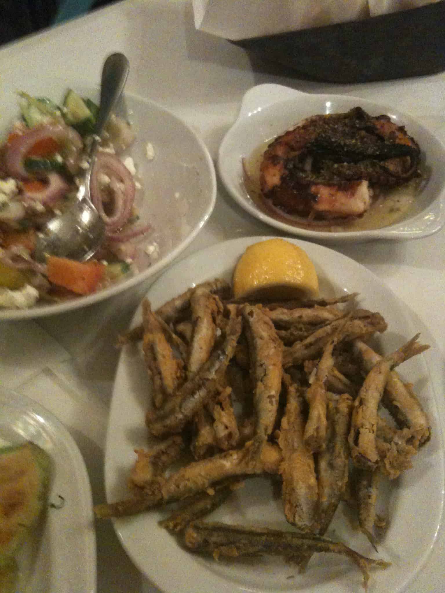 Fried smelt, octopus, and Greek salad at Mpoukia Mpoukia in Ladadika, Thessaloniki, Greece