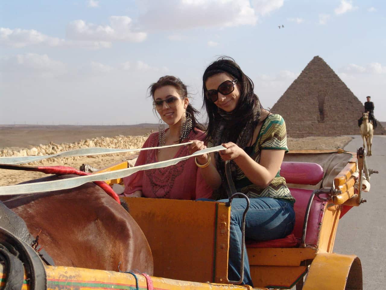 Dana and Maria on a carriage at the Pyramids of Giza in Egypt