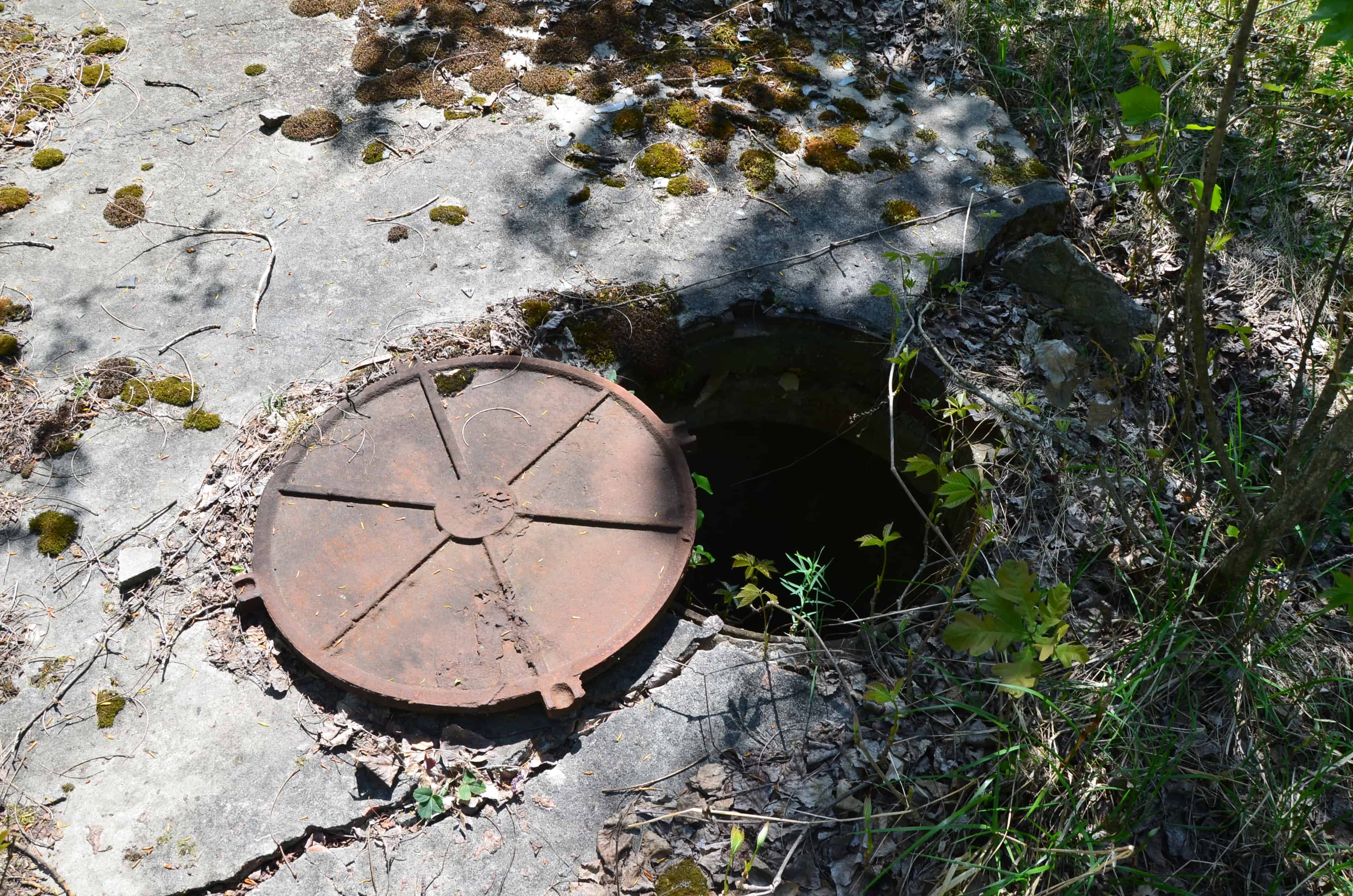 Manhole in Pripyat, Chernobyl Exclusion Zone, Ukraine