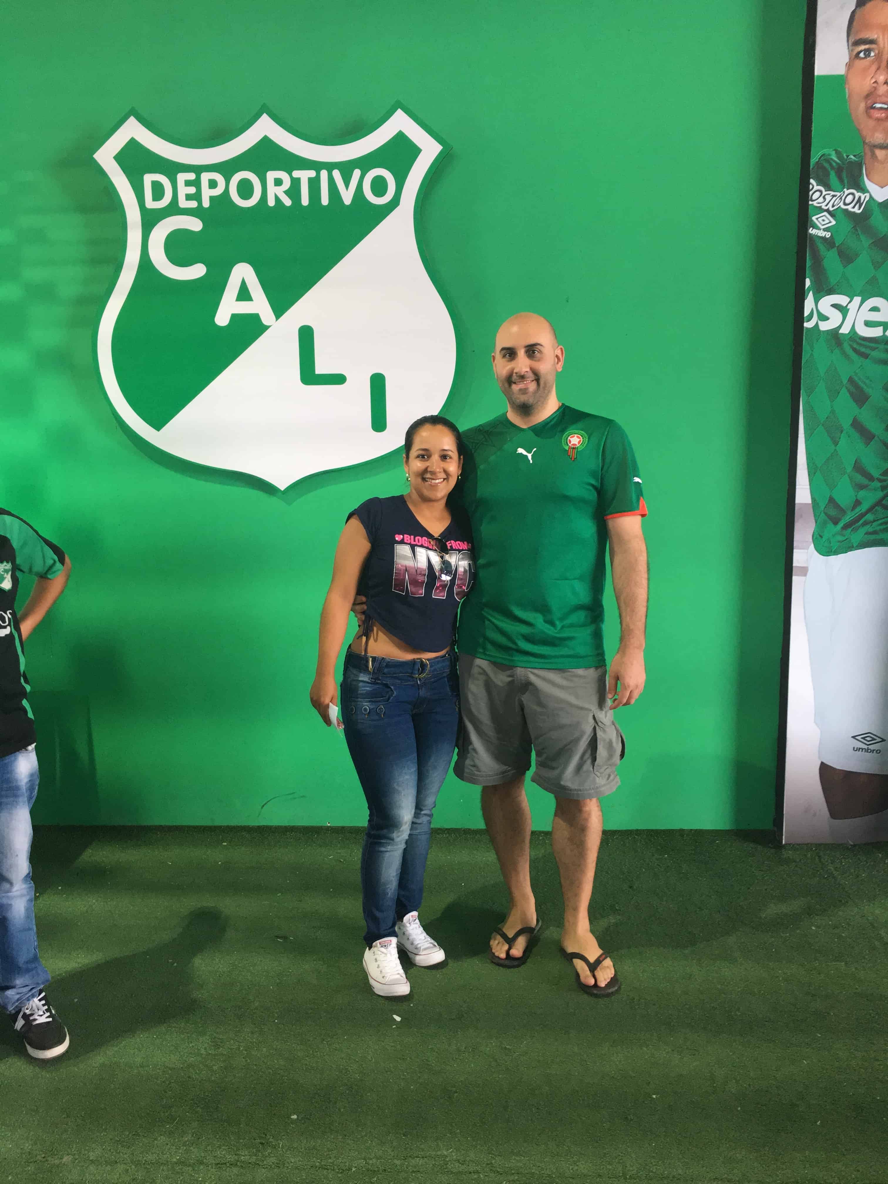 Marisol and I in front of the Deportivo Cali logo at Estadio Deportivo Cali in Palmira, Valle del Cauca, Colombia