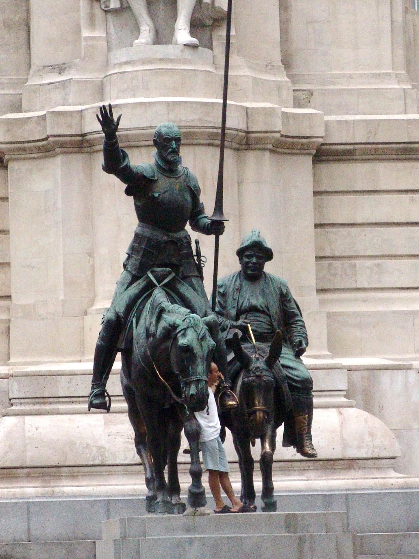 Statues of Don Quixote and Sancho Panza on the Cervantes monument at Plaza de España in Madrid, Spain