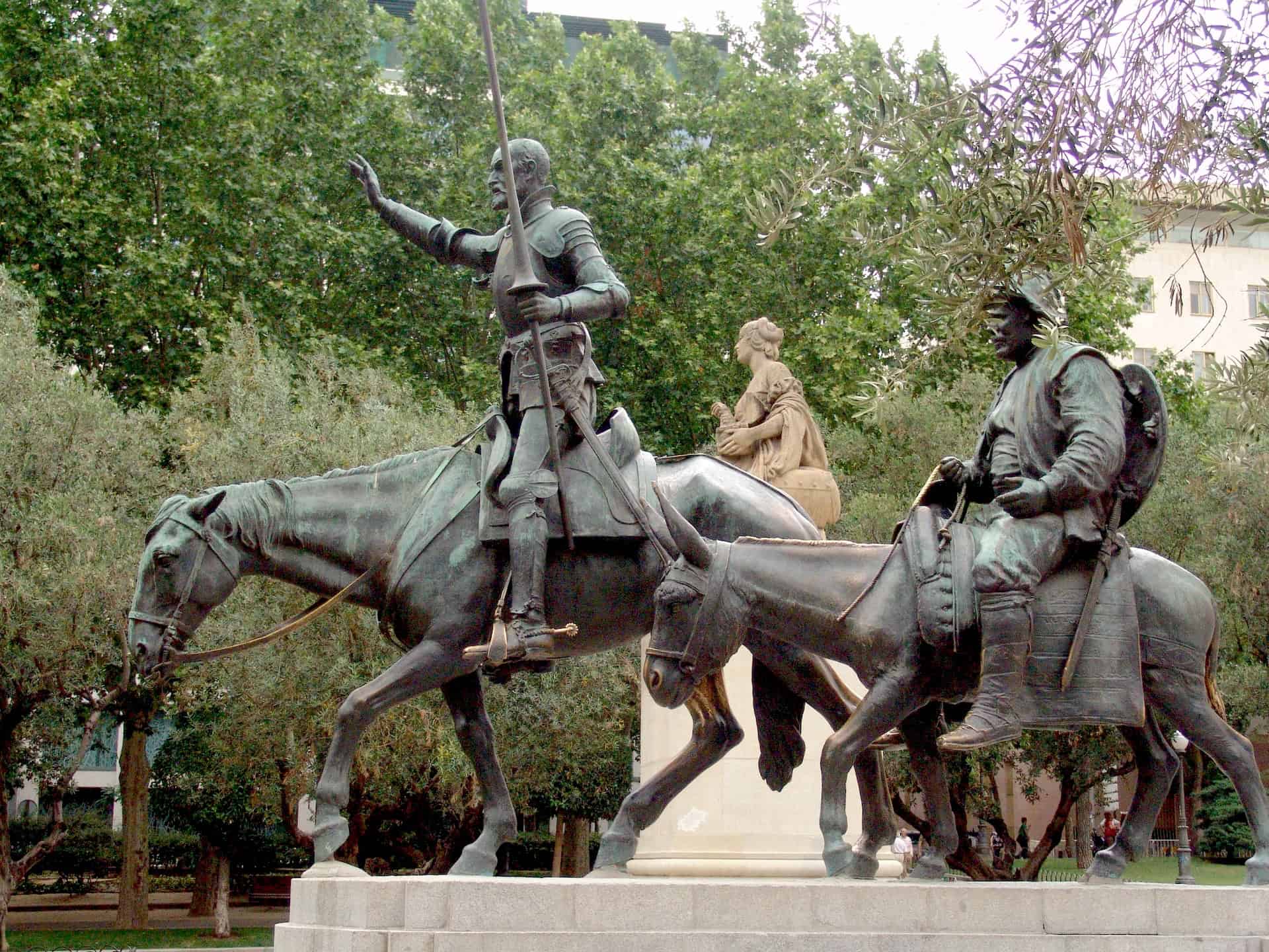 Statues of Don Quixote and Sancho Panza on the Cervantes monument at Plaza de España in Madrid, Spain