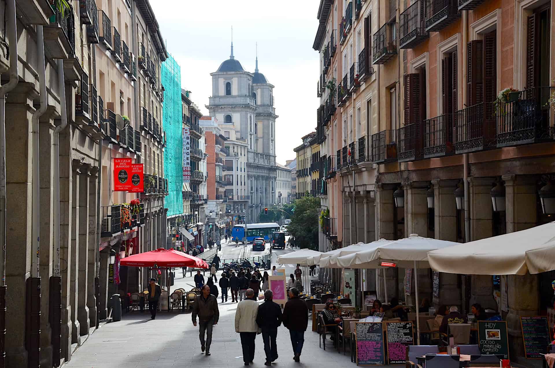 Looking down Calle de Toledo from one of the entrances to Plaza Mayor in the Historic Center of Madrid, Spain