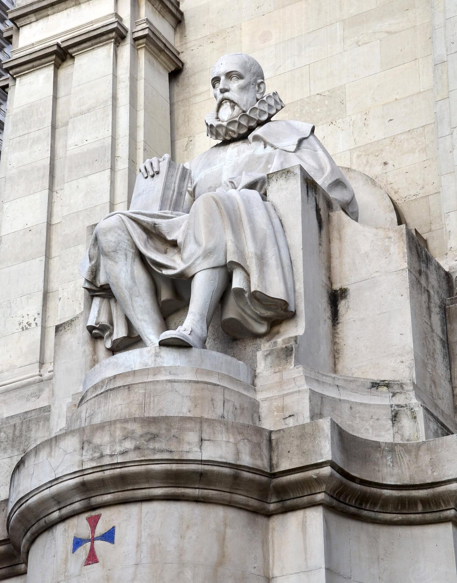 Statue of Cervantes on the Cervantes monument at Plaza de España in Madrid, Spain