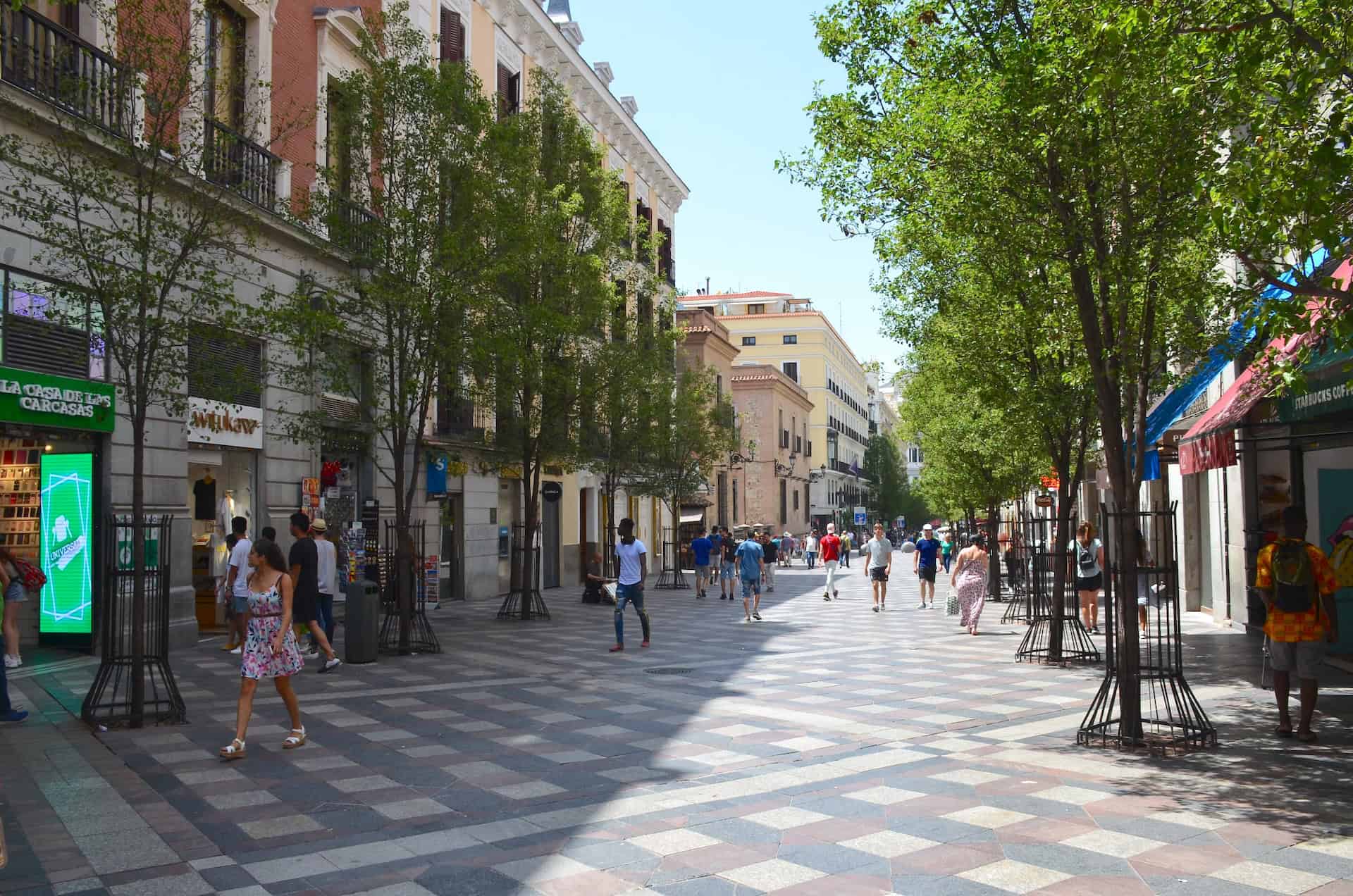 Walking down Calle del Arenal in the Historic Center of Madrid, Spain