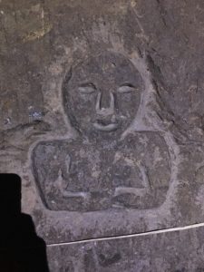 A face carved into one of the tunnels at Pirámide near Inzá, Cauca, Colombia