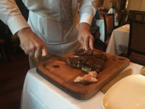The server carving our steak at Carnevino in Las Vegas, Nevada