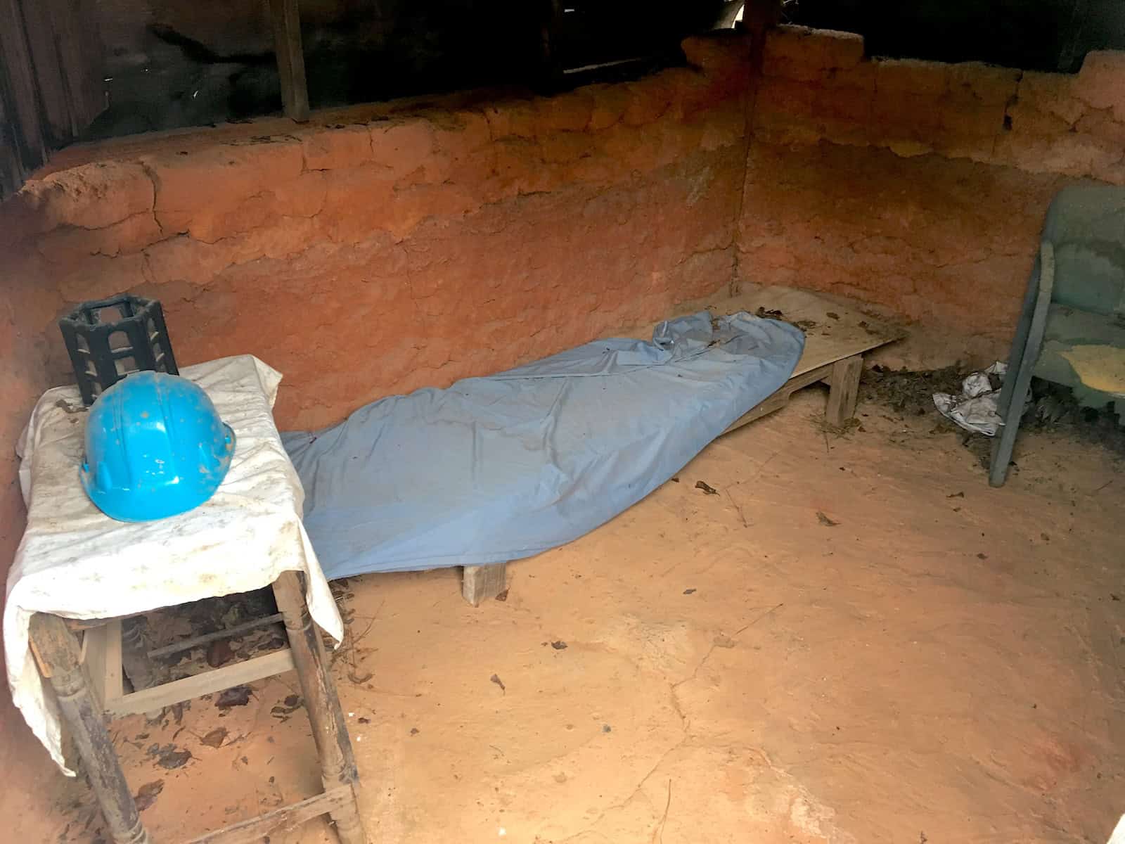 A home with a dirt floor in the poverty village at Habitat for Humanity Global Village