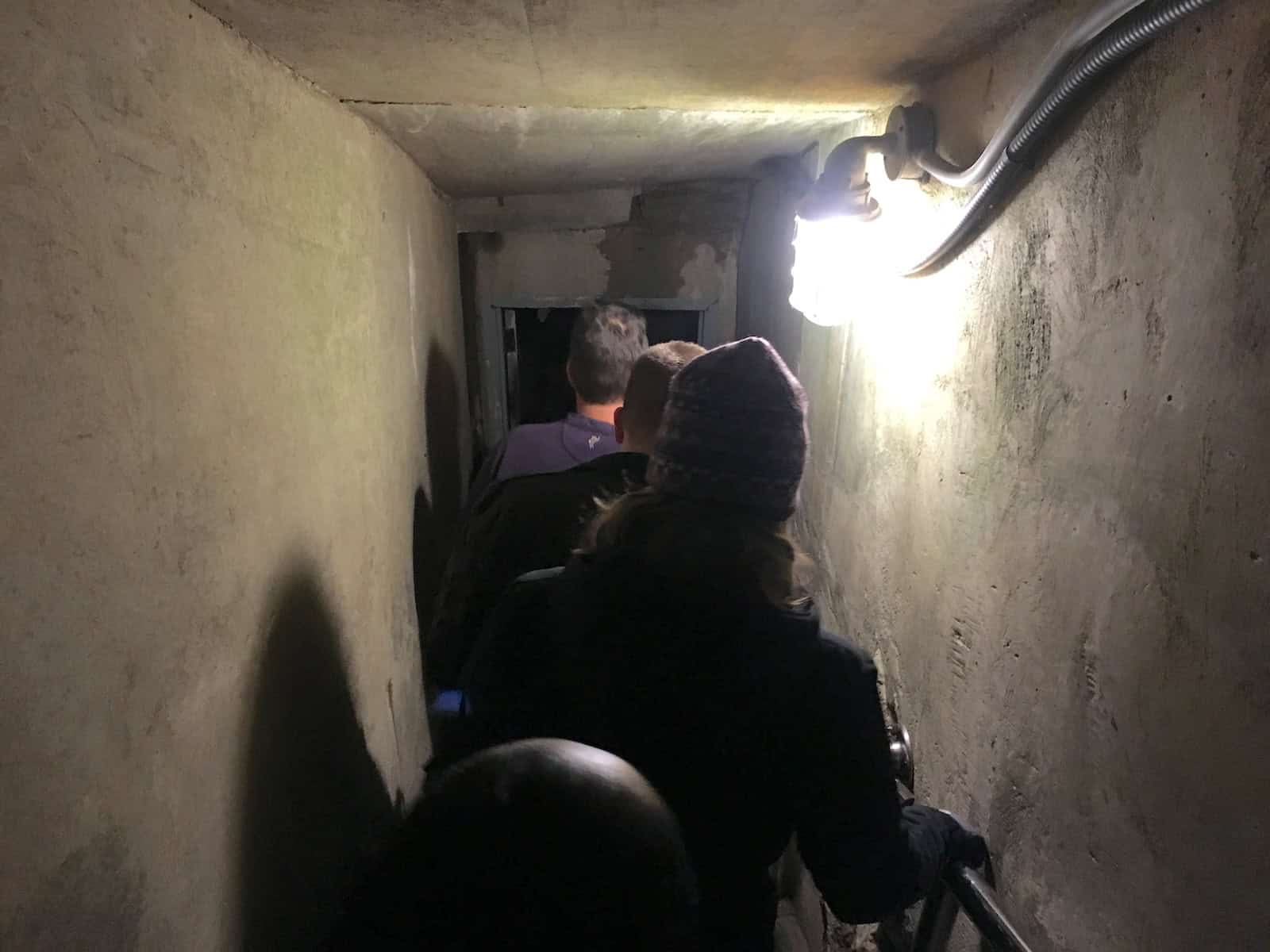 Walking through the shaft on the Domes and Dripstones tour