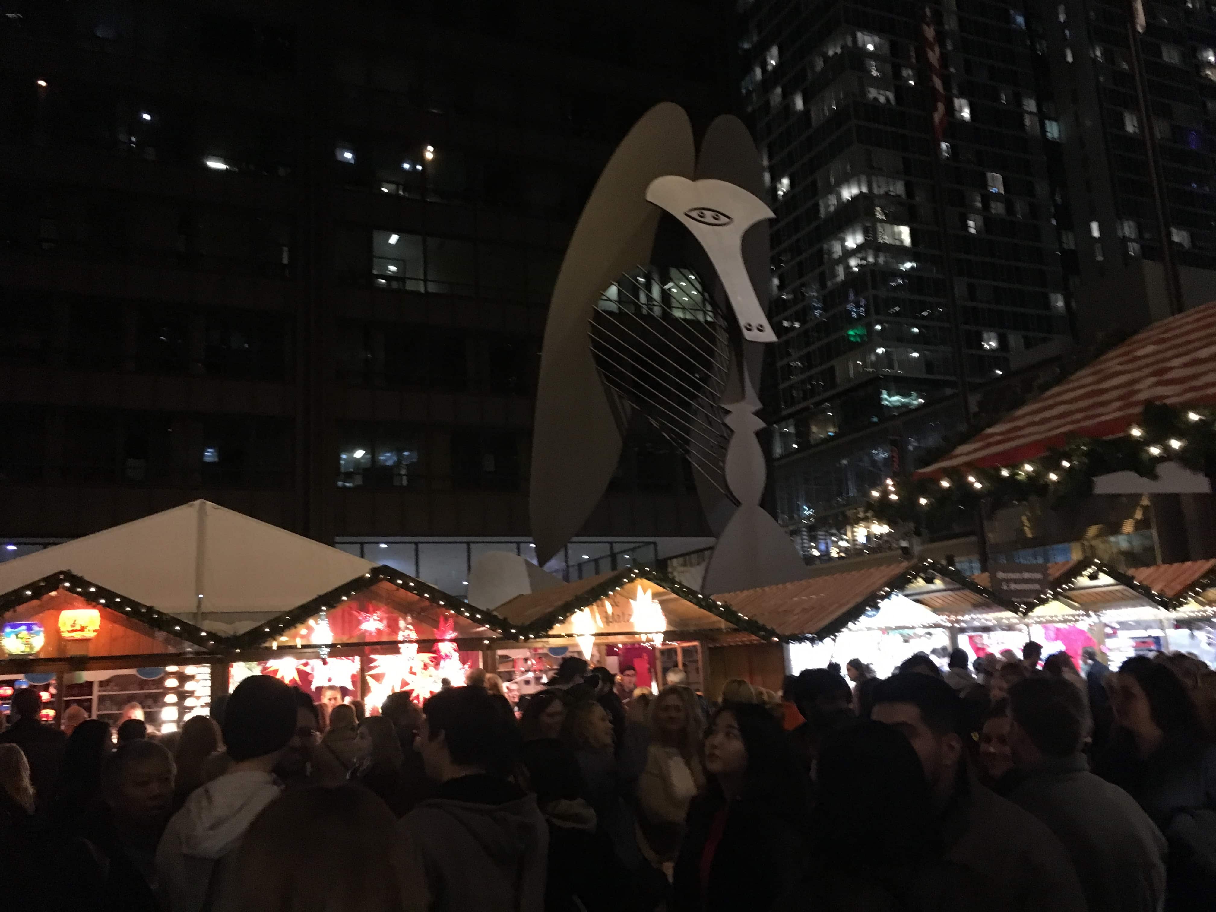 The Picasso watching over Christkindlmarket at Daley Plaza in Chicago, Illinois
