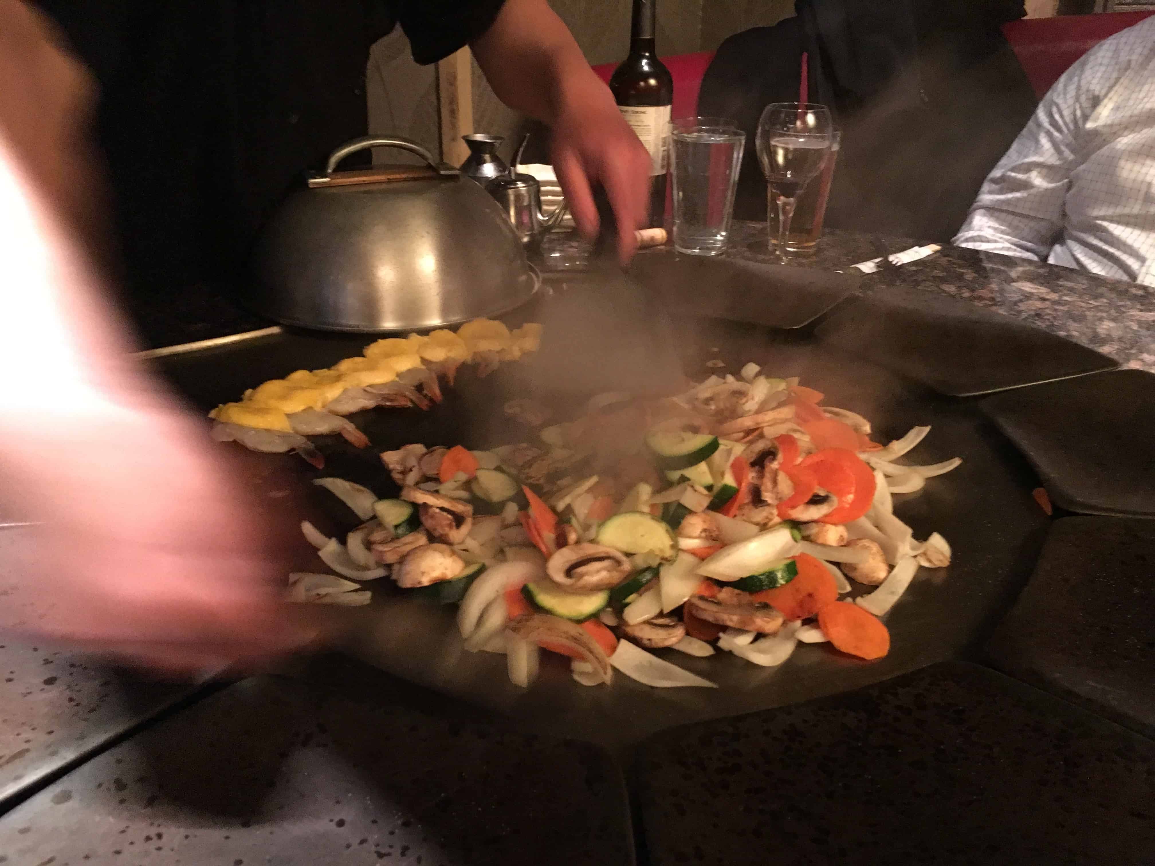 Preparing vegetables and shrimp appetizer at Ron of Japan in Chicago, Illinois