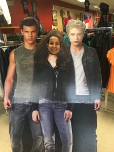 Marisol posing in a cutout at Native to Twilight in Forks, Washington