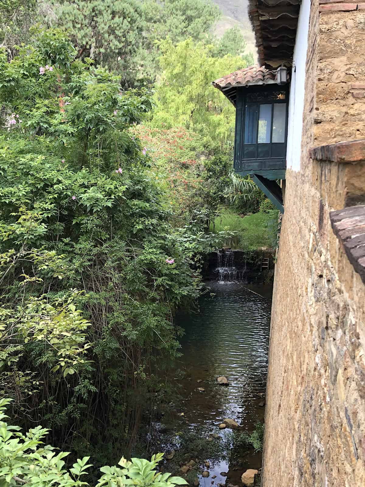 A house overlooking a creek near Parque Ricaurte