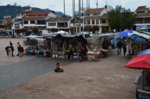 Booths selling religious items at Plaza de Bolívar in Chiquinquirá, Boyacá, Colombia