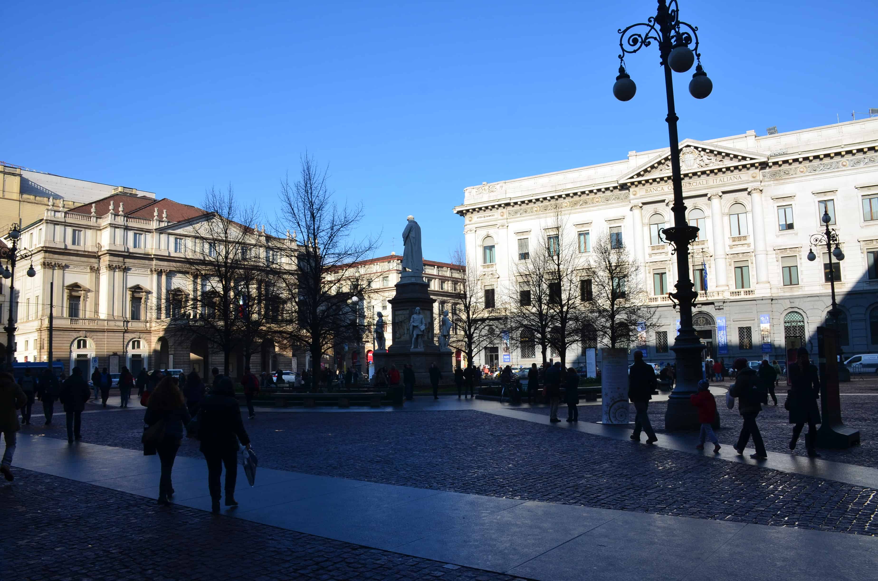La Scala (left) and Italian Commerical Bank Palace (right) on Piazza della Scala in Milan, Italy